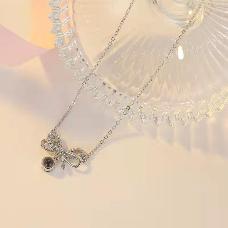 Personalized diamond set bow photo Necklace