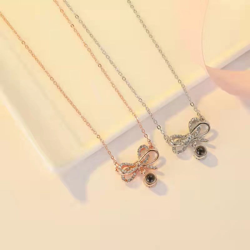 Personalized diamond set bow photo Necklace