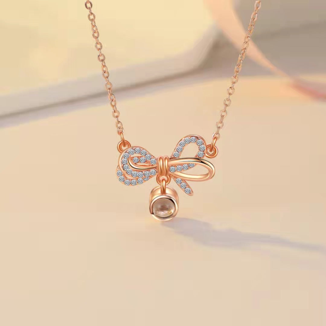 Personalized diamond set bow photo Necklace